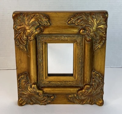 Espejo rectangular florentino ornamentado dorado pequeño vintage en tono dorado Foto 1 de 4