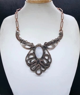 Collar de piedras preciosas de piedra lunar envuelto en alambre de cobre collar pulpo estilo joyería Foto 1 de 4