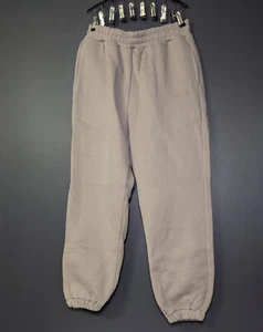 Pantalones deportivos Comfrt Signature color corteza unisex - Imagen 1 de 3