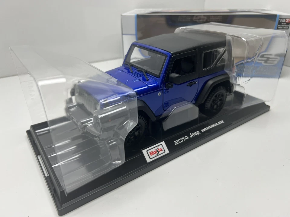 MAISTO 1: 18 比例 - 2014 Willys Jeep 牧马人蓝色 - 压铸模型车 — 第 1/4 张图片