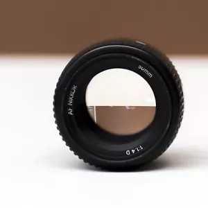 AF NIKKOR 50/1.4 D AUTO-FOCUS LENS with Sigma DG UV lens protector,original box - Picture 1 of 4