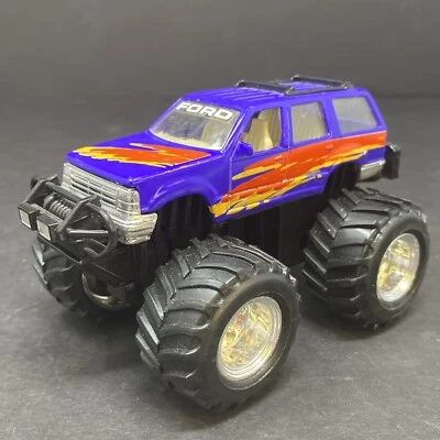Monster Truck Maisto Ford Explorer elevado 5" diecast bonito - púrpura rojo naranja Foto 1 de 4