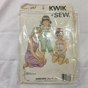 UNUSED 1257 VINTAGE SEWING PATTERN KWIK SEW GIRLS JUMPSUIT OPENED - Picture 1 of 1