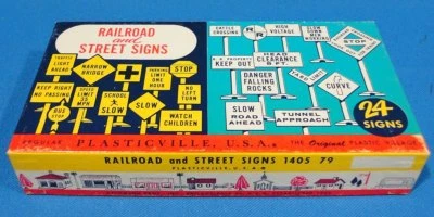 VINTAGE PLASTICVILLE BACHMANN BROTHERS 24 WHITE RAILROAD AND YELLOW STREET SIGNS - Image 1 of 2