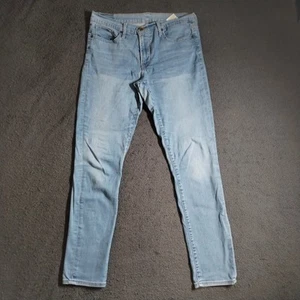 Levis Jeans Womens 34x30 Blue Light Wash Denim Tapered Stretch Logo Button Zip - Picture 1 of 21