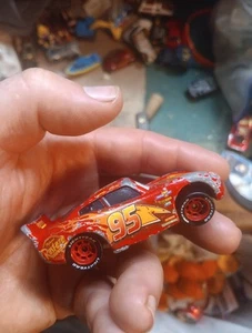 Disney Pixar Cars Lightning McQueen #95 Rust-Eze 1/64 - Bild 1 von 7