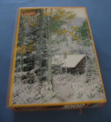 1000 piece Kodacolor "Winter Cabin" jigsaw puzzle by RoseArt - Image 1 of 4