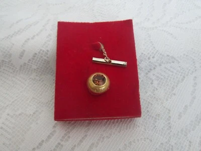 Corbata vintage en tono dorado con piedra dorada Foto 1 de 3