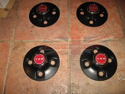 Новый набор из 4 черных колпаков ступицы центры колес со значками для 1970-1976 Triumph TR6 - Изображение 1 из 2