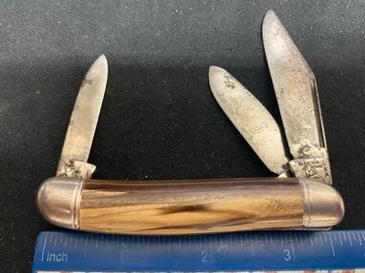 Cuchillo de ganadero marca Hammer EE. UU., asas compuestas remolino de cobre Foto 1 de 4