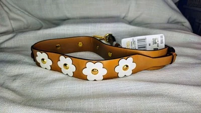 Correa de guitarra Michael Kors marrón con flores blancas nueva con etiquetas Foto 1 de 3