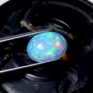 2 kt 12,4 x 9,5 mm Natürlicher AAA Grün Rot Feuer Äthiopischer Opal Oval Cabochon - Bild 1 von 10