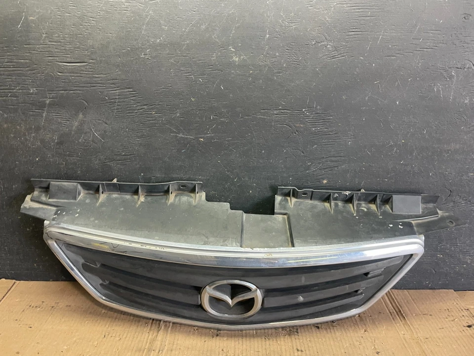 Mazda MPV 2000 2001 parrilla superior delantera OEM P8682 DG Foto 1 de 4