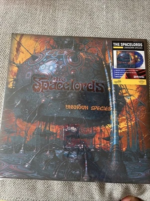 SPACELORDS.THE - UNKNOWN SPECIES (LIMITED BLUE/YELLOW  Splatter VINYL LP NEW! - Bild 1 von 2
