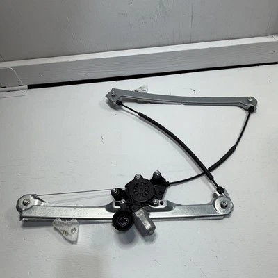 MAZDA 3 2019-2025 hatchback delantero izquierdo puerta ventana regulador con motor OEM Foto 1 de 4