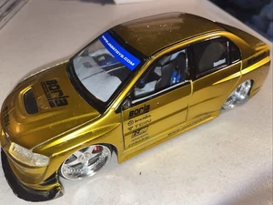 Coche modelo a escala 1:24 Jada Toys Mitsubishi Motors Lancer Evolution VIII juguete como está - Imagen 1 de 11