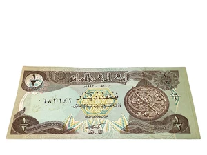 1993 - 1/2 Dinar, Bank of Iraq, I-78, Emergency Issue, UNC, S/N 0682143 (#112) - Picture 1 of 2