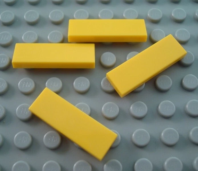 LEGO Lot of 4 Yellow 1x3 Tiles - Image 1 of 1