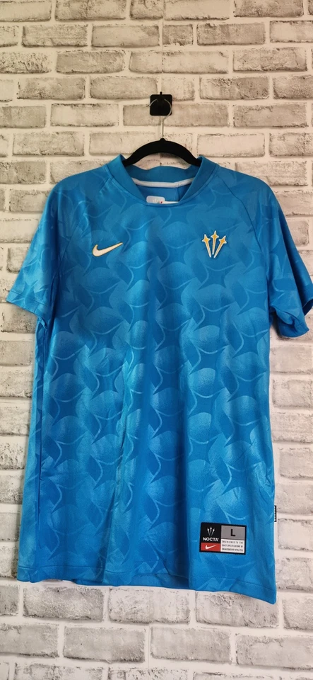 Nike NOCTA Turks and Caicos Soccer Jersey Blue Glow DR2616-450 Men’s Size Large