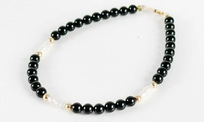 "Brazalete de cuentas de ónix negro con perlas de ónix de oro amarillo de 14 quilates 7"" delicado acento de tenis" Foto 1 de 4