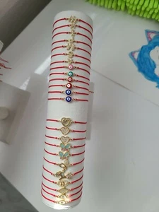 Red nylon thread with gold plated materials. High quality. - Picture 1 of 2
