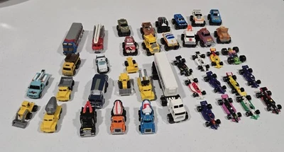 Micro Machines Construction & DPW trucks Indy & Turbo Wheels Lot Of 34 - Image 1 of 4