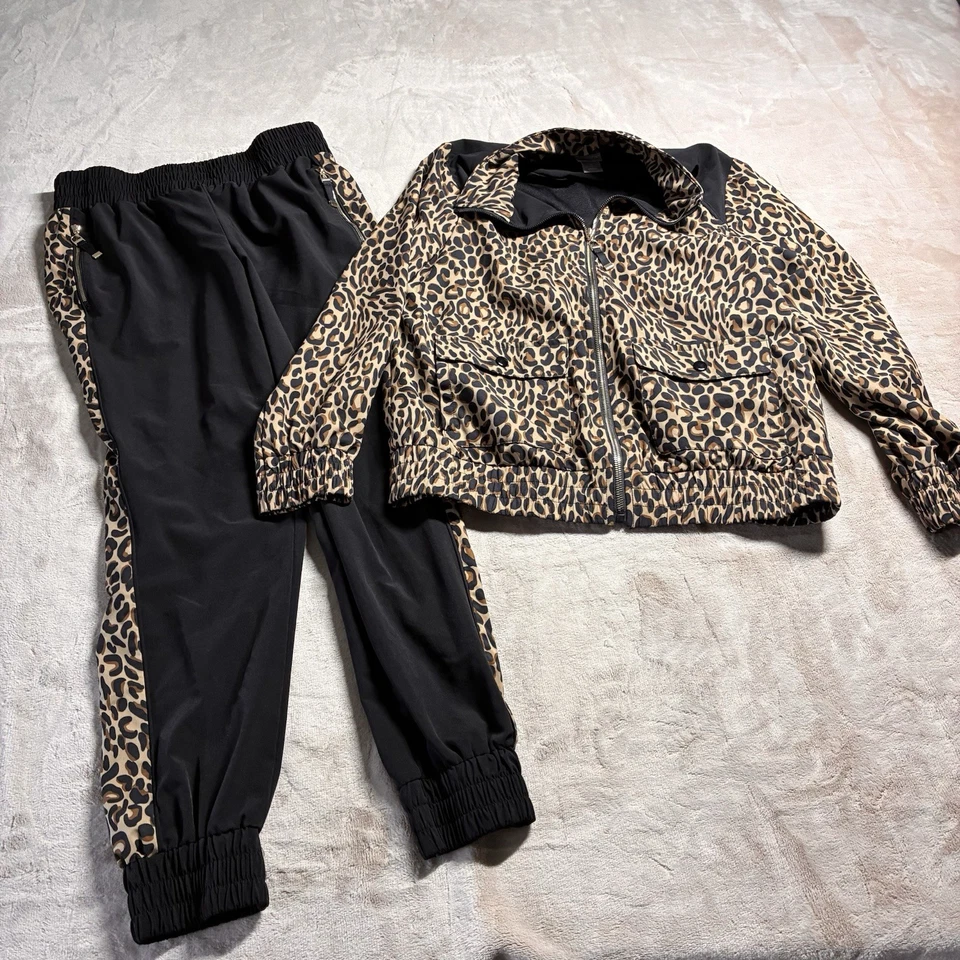 Chico’s Zenergy Estampado Leopardo Atletismo Pista Chaqueta Jogger Conjunto Mujer’s 0 Foto 1 de 4