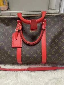 Louis Vuitton Keepall Bandoulière red - Picture 1 of 8