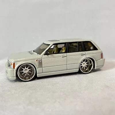Range Rover Dropstars Hot Wheels con pilotos reales escala 1:50 premium como nuevo suelto Foto 1 de 4