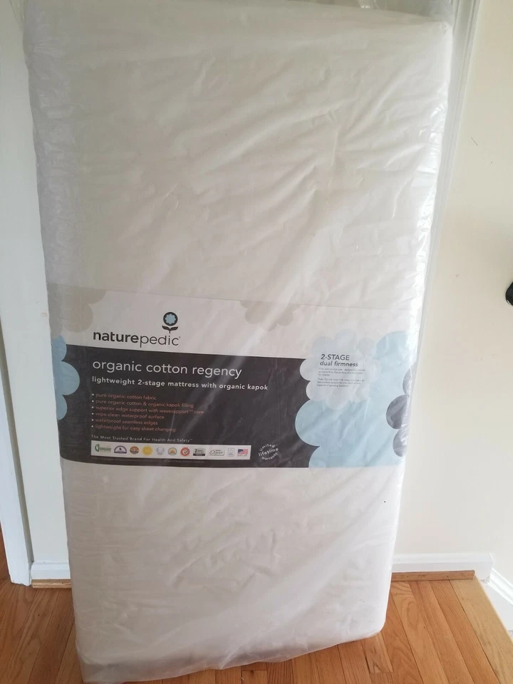Colchón para cuna de algodón orgánico Naturepedic, 51" x 27", impermeable, transpirable Foto 1 de 1