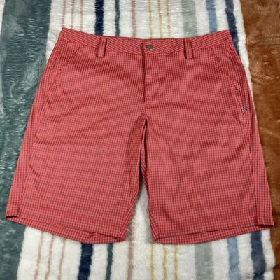 Pantalones cortos de golf Under Armour para hombre 38 11” 1242764 rosa gris a cuadros chinos planos 916 Foto 1 de 4