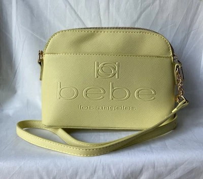 NWT Bebe Polly Dome Shaped Light Yellow Crossbody Bag 9”L x 6.5”H x 3.5”D - Изображение 1 из 4