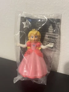 2022 McDonald’s Super Mario Bros Movie Nintendo Happy Meal Spinning Peach Toy 4 - Picture 1 of 2