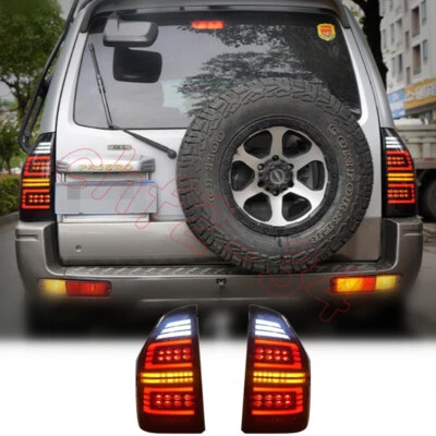 Conjunto de luz trasera dinámica LED de humo reacondicionado para Mitsubishi Montero Pajero V73 V77 Foto 1 de 4