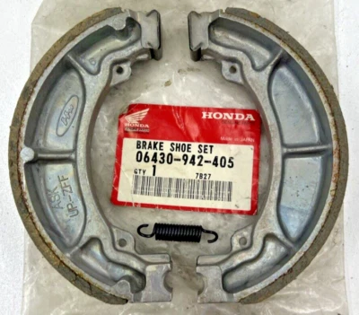 НОВЫЙ ИЗ СТАРЫХ ЗАПАСОВ OEM HONDA МОТОЦИКЛ 1977-2023 CRF50F, XR50R ТОРМОЗНОЙ БАШМАК КОМПЛЕКТ 06430-942-405 - Изображение 1 из 4