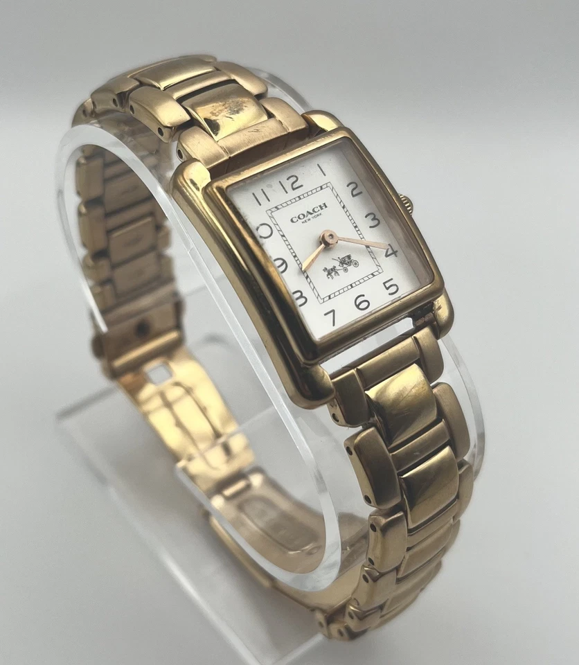 Reloj Coach Cuarzo Acero Inoxidable Tono Dorado Cuadrado Esfera Blanca Necesita Batería Nueva Foto 1 de 4