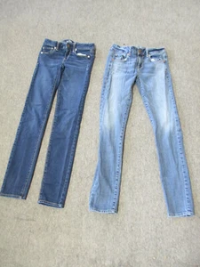 2 paia jeans elasticizzati da donna AMERICAN EAGLE 1 lavaggio Med, 1 lavaggio scuro taglia 0 - Foto 1 di 10