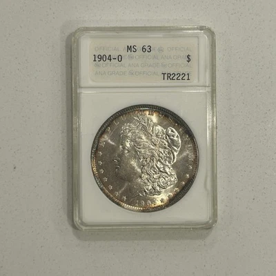 1904-O $1 dólar de plata Morgan antiguo ANA Genie soporte de lámpara MS-63 con tonificación de borde Foto 1 de 4