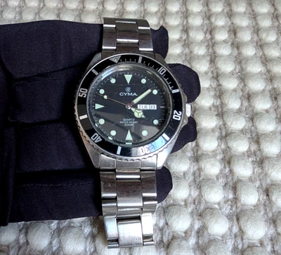 Reloj Hombre Cyma 9111 Diver Cuarzo 39.8mm - Acero Inoxidable, Esfera Negra, 200M Foto 1 de 4