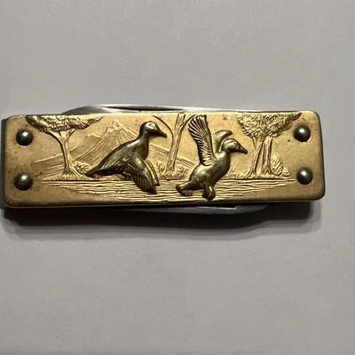 Cuchillo y lima imperial de acero inoxidable. Con dos patos  Foto 1 de 4