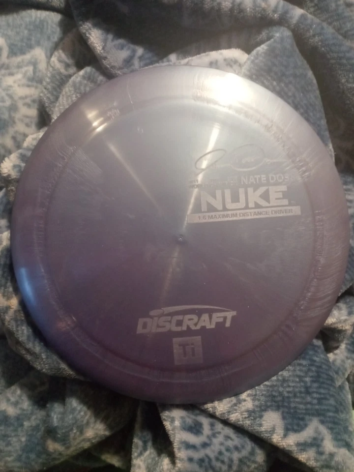 Discraft Ti Nuke 3x Nate Doss 173-174 gram green Purple golf disc - Image 1 of 1