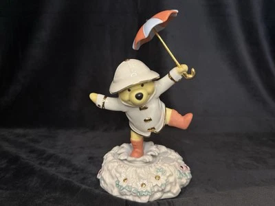 Figura Caja de Música Lenox Disney Showcase Pooh Cantando Bajo la Lluvia LEER Foto 1 de 4