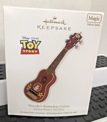 HALLMARK TOY STORY  WOODY'S ROUND UP GUITAR MAGIC CHRISTMAS ORNAMENT 2012 NEW - Image 1 of 2