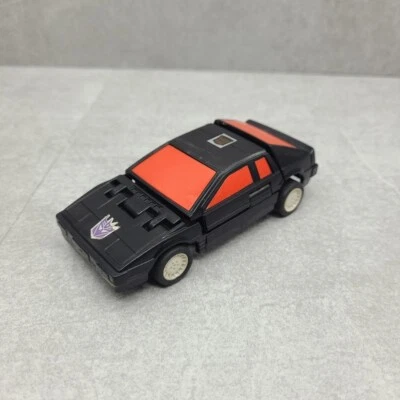 Transformers G1 1986 Runabout Lotus Espirit Hasbro Takara coche negro Pull and Go  Foto 1 de 4