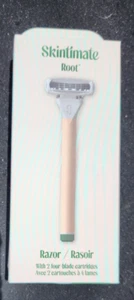Rasoio radice Skintimate con 2 cartucce a quattro lame nuovo/sigillato - Foto 1 di 2