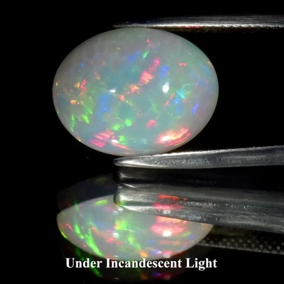💎 6.52ct Oval Cabochon Natural White Opal- Rainbow Flash, Stunning Ethiopia Gem - Image 1 of 4