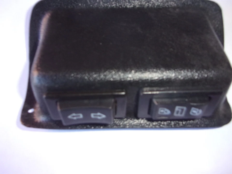 INTERRUPTOR DE BLOQUEO E VENTANA ELÉCTRICA DELANTERA HUMMER H1 CON BISEL DE PLÁSTICO Foto 1 de 1