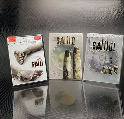 SAW DVD Collection Parts 1, 2 and 3 Horror Movie Classics Bonus Features  - Image 1 of 4