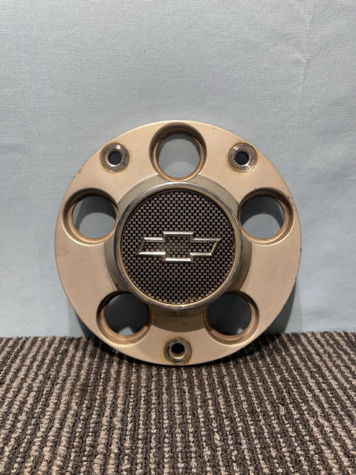 Tapacubos central de rueda de acero Chevrolet Impala Police 2000-2011 09593297 OEM Foto 1 de 4