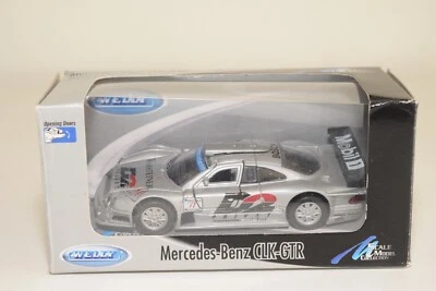 A35 1:43 WELLY MERCEDES-BENZ CLK GTR CLK-GTR GRIGIO NUOVO CON SCATOLA - Immagine 1 di 4
